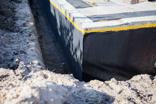 Professional Waterproofing technician working in Milton, WA